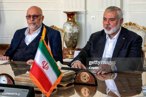 Ismail Haniyeh , the Doha-based political bureau chief of the Palestinian Islamist movement Hamas, heads a delegation meeting with Iran's Foreign...