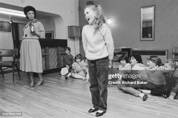 Amateur performers rehearse the musical 'Annie' at Dolman Theatre in Newport, Wales, on 12th March 1985.