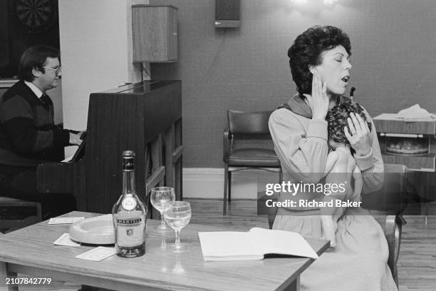 Amateur performers rehearse the musical 'Annie' at Dolman Theatre in Newport, Wales, on 12th March 1985.