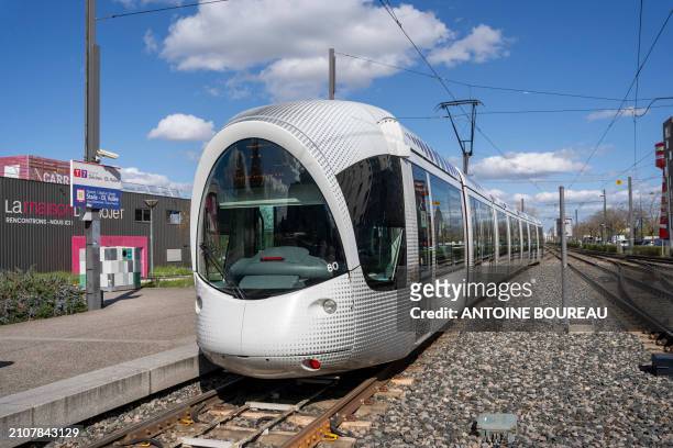Tramway T7 line serving Decines OL Vall?e at the Vaulx en velin la soie stop on the outskirts of Lyon, France on 23 March 2024.