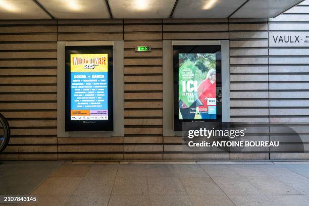 Video screen showing advertising in Vaulx en velin la soie subway station on the outskirts of Lyon, France on 23 March 2024.