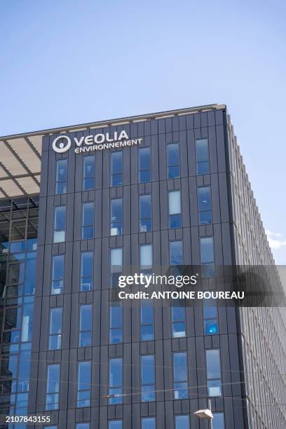 Regional headquarters of water company Veolia environnement, building opposite Vaulx en Velin la soie metro station on the outskirts of Lyon, France...