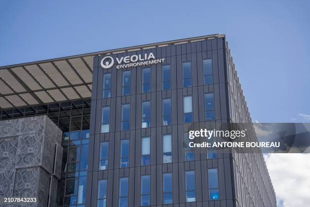 Regional headquarters of water company Veolia environnement, building opposite Vaulx en Velin la soie metro station on the outskirts of Lyon, France...