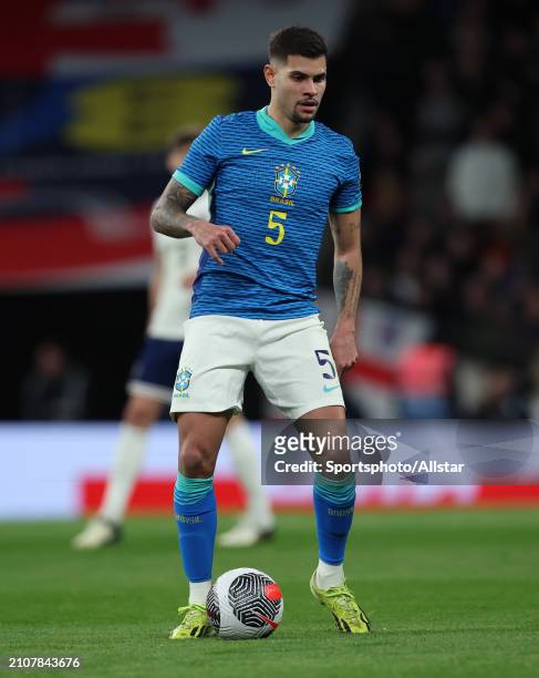 Bruno Guimaraes of Brazil on the ball during the international friendly match between England and Brazil at Wembley Stadium on March 23, 2024 in...