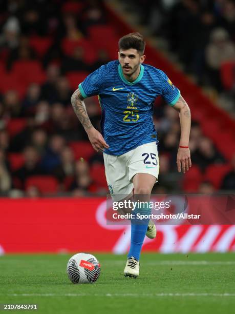 Lucas Beraldo of Brazil on the ball during the international friendly match between England and Brazil at Wembley Stadium on March 23, 2024 in...