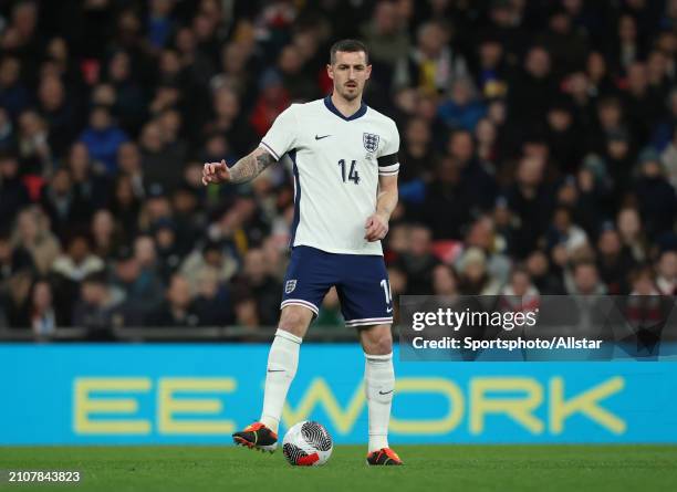 Lewis Dunk of England on the ball during the international friendly match between England and Brazil at Wembley Stadium on March 23, 2024 in London,...