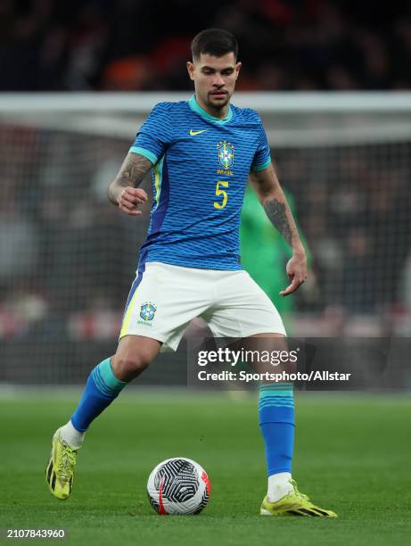 Bruno Guimaraes of Brazil on the ball during the international friendly match between England and Brazil at Wembley Stadium on March 23, 2024 in...