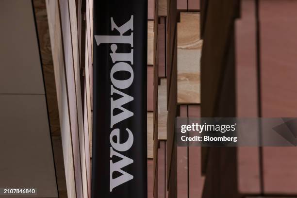 Banner outside WeWork offices in the City of London, UK, on Tuesday, March 26, 2024. Adam Neumann and several partners submitted an offer to...