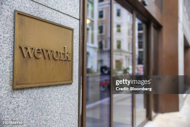 Sign outside the entrance to a WeWork office space in the City of London, UK, on Tuesday, March 26, 2024. Adam Neumann and several partners submitted...