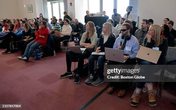 Cambridge, MA The audience, including four judges, listen to a presentation. The judges, on the right, from left to right are: Stefanie Mueller ;...