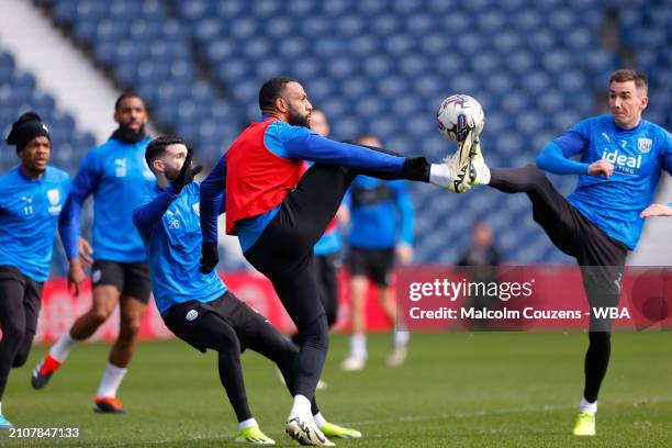 Matt Phillips of West Bromwich Albion competes with Jed Wallace during an open training session at The Hawthorns on March 26, 2024 in West Bromwich,...