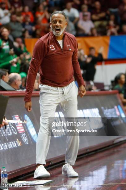Virginia Tech Hokies Head Coach Kenny Brooks yells instructions from the sidelines during the Marshall Thundering Herd game versus the Virginia Tech...
