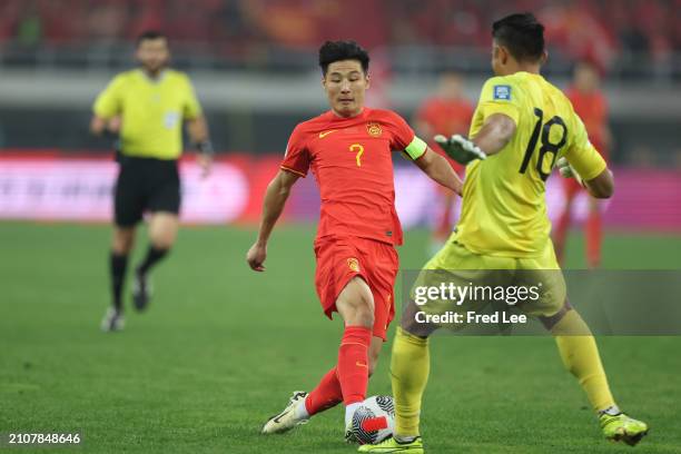 Wu Lei of China controls the ball during the 2026 FIFA World Cup Qualifier between China and Singapore at Tianjin Olympic Centre Stadium on March 26,...