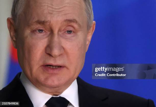 Russian President Vladimir Putin speaks during an annual expanded Prosecutor General's Office meeting, March 26 in Moscow, Russia. Dozens people were...