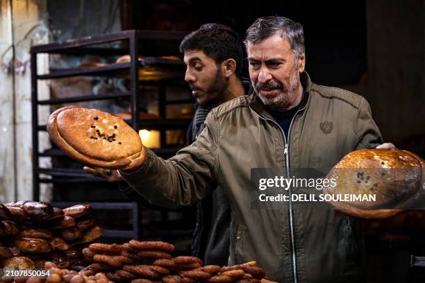 Street vendors sell "Maarouk", a sweet pastry usually stuffed with dates or other sweet fillings consumed during the Muslim holy fasting month of...