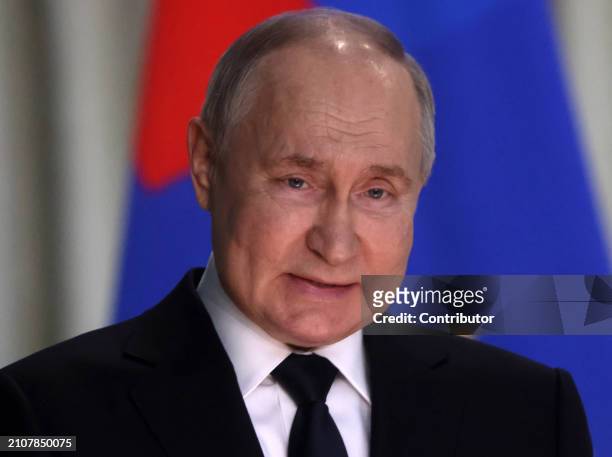Russian President Vladimir Putin speeches during an annual expanded Prosecutor General's Office meeting, March 26 in Moscow, Russia. Dozens people...
