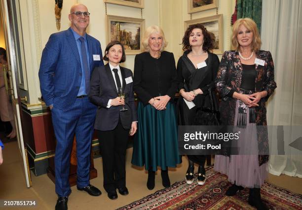 Harlan Coben, Donna Tartt, Queen Camilla, Helena Bonham Carter and Dame Joanna Lumley during a reception to mark the findings of a new research study...
