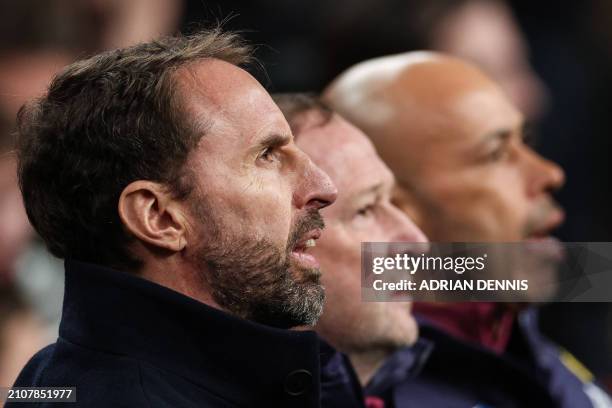 England's manager Gareth Southgate sings the national anthem during the International friendly football match between England and Belgium at Wembley...