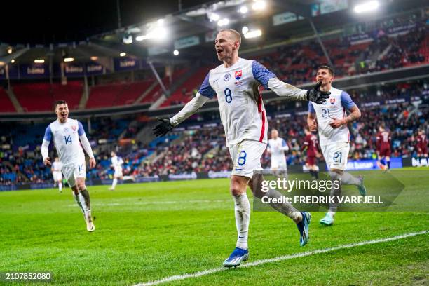 Slovakia's midfielder Ondrej Duda celebrates scoring during the friendly football match between Norway and Slovakia in Oslo, Norway, on March 26,...