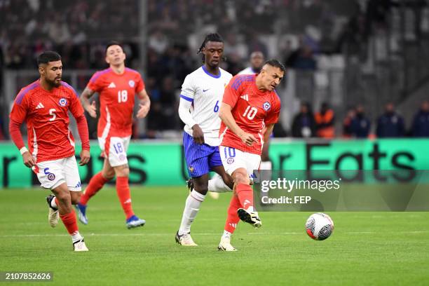 Paulo DIAZ - 06 Eduardo CAMAVINGA - 10 Alexis SANCHEZ during the friendly match between France and Chile at Orange Velodrome on March 26, 2024 in...