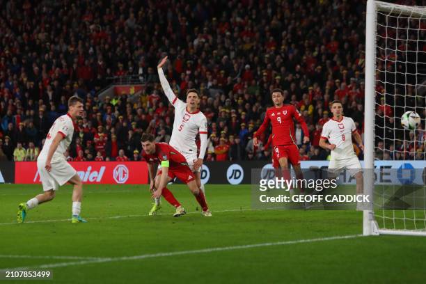Wales' defender Ben Davies has a goal disallowed during the UEFA EURO 2024 qualifier play-off final first leg football match between Wales and Poland...