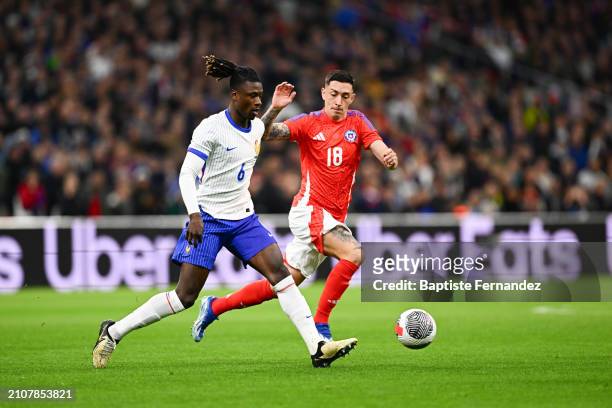 Eduardo CAMAVINGA of France and Rodrigo ECHEVERRIA of Chile during the friendly match between France and Chile at Orange Velodrome on March 26, 2024...