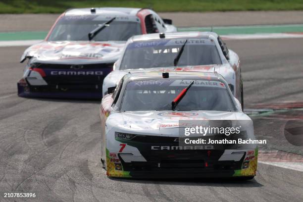 Justin Allgaier, driver of the BRANDT/Rev1 Energy Chevrolet, Cole Custer, driver of the Haas Automation Ford, and Sam Mayer, driver of the...