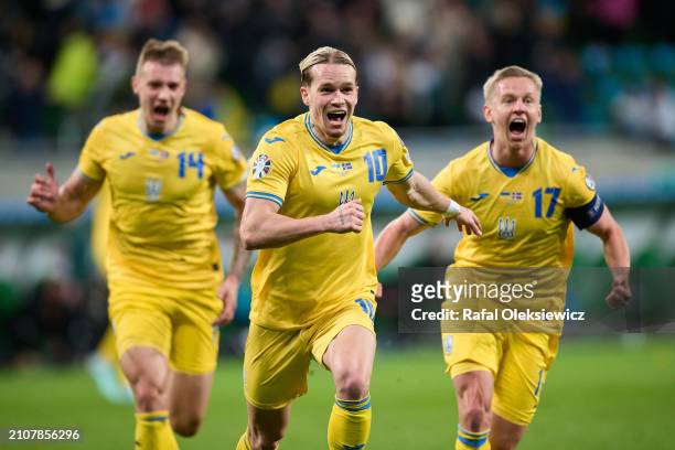 Mykhailo Mudryk of Ukraine celebrates scoring his team's second goal during the UEFA EURO 2024 Play-Offs final match between Ukraine and Iceland at...