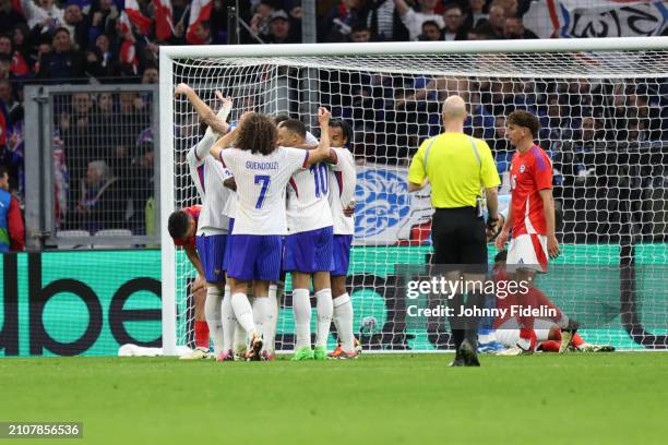 Matteo GUENDOUZI of France , Kylian MBAPPE of France , Jules KOUNDE of France and Olivier Giroud of France celebrate after scores during the friendly...