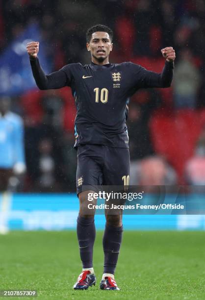 Jude Bellingham of England celebrates after scoring the late equalising goal during the international friendly match between England and Belgium at...