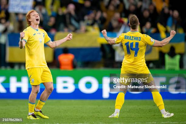 Yukhym Konoplia of Ukraine and Volodymyr Brazhko of Ukraine celebrates after winning match during the UEFA EURO 2024 Play-Offs final match between...
