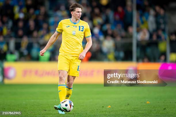 Illia Zabarnyi of Ukraine controls the ball during the UEFA EURO 2024 Play-Offs final match between Ukraine and Iceland at Tarczynski Arena on March...