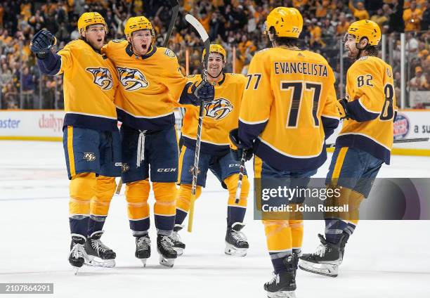 Mark Jankowski celebrates his goal with Jeremy Lauzon and Luke Evangelista of the Nashville Predators against the Vegas Golden Knights during an NHL...