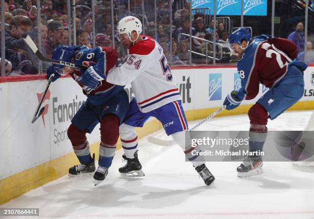 Zach Parise of the Colorado Avalanche skates against Jordan Harris of the Montreal Canadiens at Ball Arena on March 26, 2024 in Denver, Colorado.