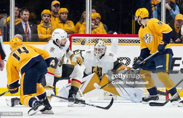 Gustav Nyquist of the Nashville Predators scores a power play goal against Jiri Patera of the Vegas Golden Knights during an NHL game at Bridgestone...