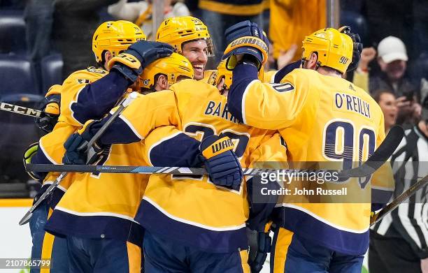 Gustav Nyquist celebrates his game-tying goal with Tyson Barrie, Ryan O'Reilly, and Roman Josi of the Nashville Predators against the Vegas Golden...