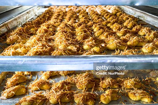 Workers are making cookies at the J&amp;C Cookies factory in Bandung, Indonesia, on March 27, 2024. The cookie manufacturer, J&amp;C Cookies, is...