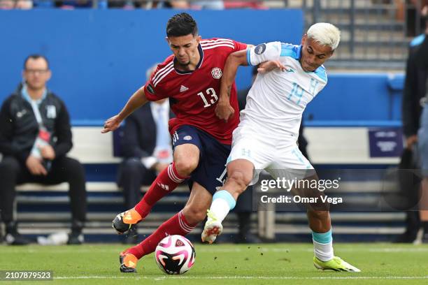 Jefferson Brenes of Costa Rica and Andy Najar of Honduras battle for the ball during Play-In - Concacaf Nations League match between Costa Rica and...