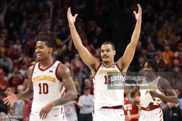 Robert Jones of the Iowa State Cyclones celebrates with teammates after defeating the Washington State Cougars 67-56 in the second round of the NCAA...