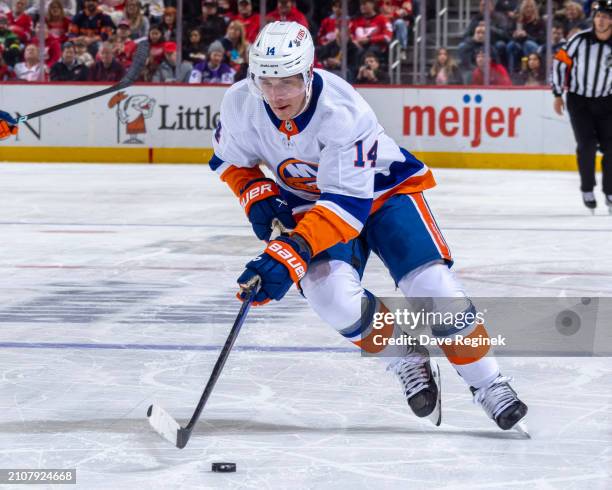 Bo Horvat of the New York Islanders skates up ice with the puck against the Detroit Red Wings during the second period at Little Caesars Arena on...