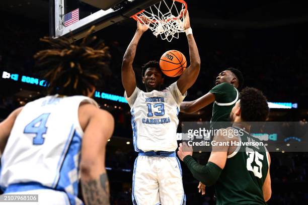 Jalen Washington of the North Carolina Tar Heels dunks the ball during the second half of the second round of the NCAA Men's Basketball Tournament...