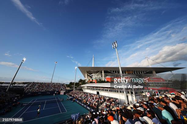 Naomi Osaka of Japan serves against Elina Svitolina of the Ukraine during their match on day 8 of the Miami Open at Hard Rock Stadium on March 23,...
