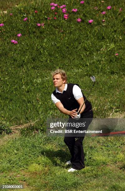 Dutch actor, presenter, painter and photographer Sander Frank Foppele playing Golf
