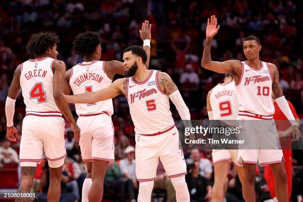 The Houston Rockets celebrate in the first half against the Utah Jazz at Toyota Center on March 23, 2024 in Houston, Texas. NOTE TO USER: User...