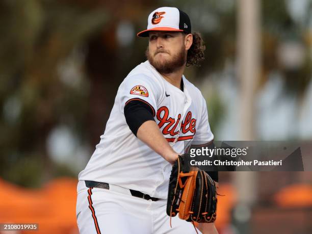 Cole Irvin of the Baltimore Orioles pitches during a spring training game against the Atlanta Braves at Ed Smith Stadium on March 13, 2024 in...