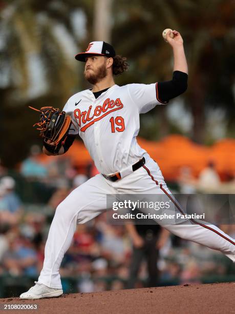 Cole Irvin of the Baltimore Orioles pitches during a spring training game against the Atlanta Braves at Ed Smith Stadium on March 13, 2024 in...