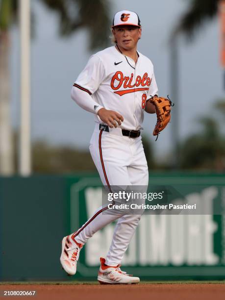 Jackson Holliday of the Baltimore Orioles sin action during a spring training game against the Atlanta Braves at Ed Smith Stadium on March 13, 2024...