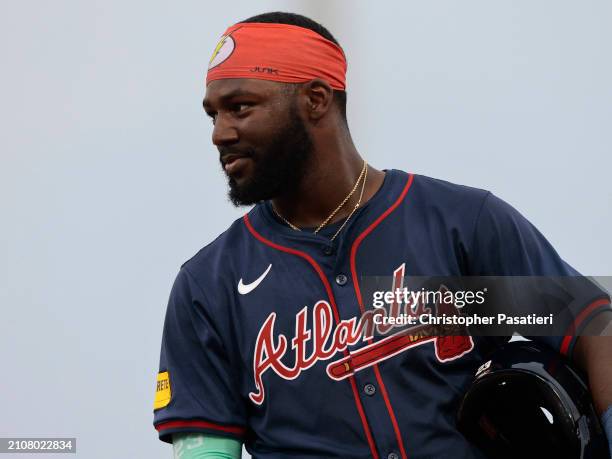 Michael Harris II of the Atlanta Braves look on as he stands on first base after walking during the top of the fourth inning of a spring training...