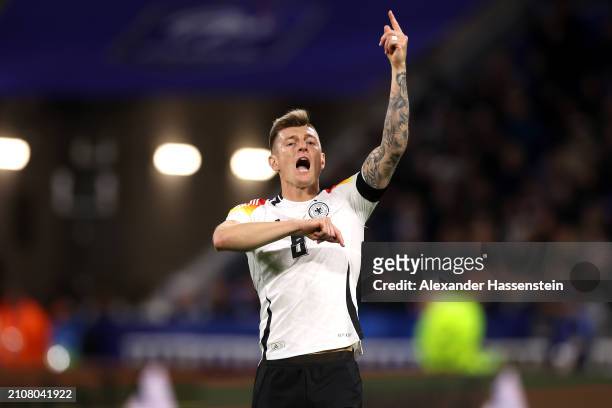 Toni Kroos of Germany reacts during the international friendly match between France and Germany at Groupama Stadium on March 23, 2024 in Lyon, France.