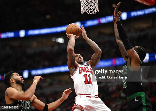 DeMar DeRozan of the Chicago Bulls shoots in the second half against the Boston Celtics at the United Center on March 23, 2024 in Chicago, Illinois....